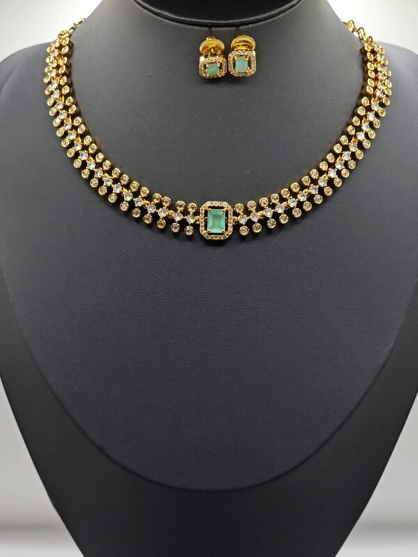 AD pastel green stone studded choker with matching earrings